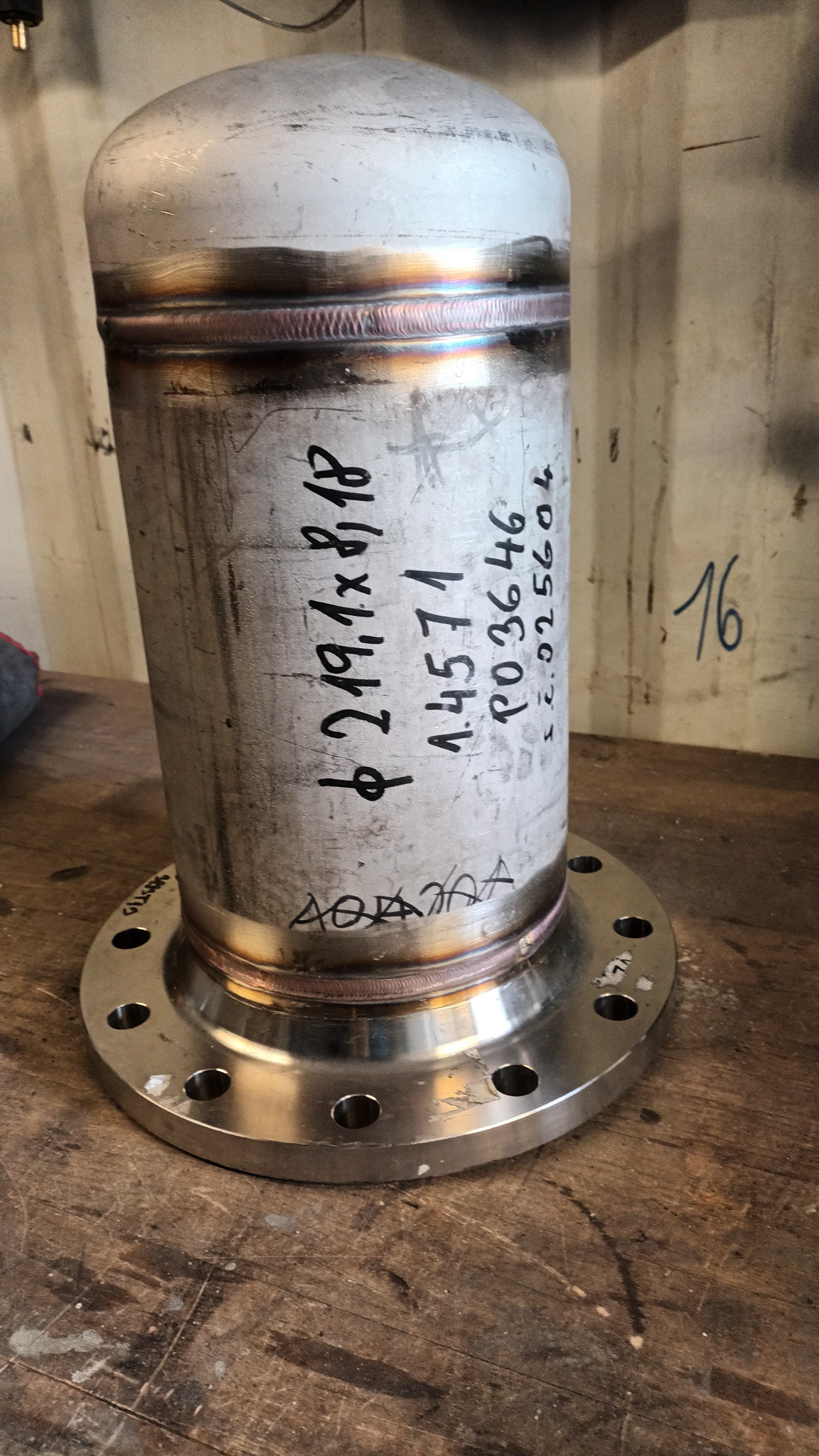 Welders working on boiler construction